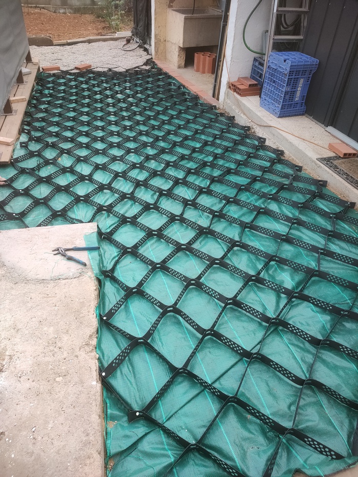 Laying the Geocelda Matting and filling with Stones