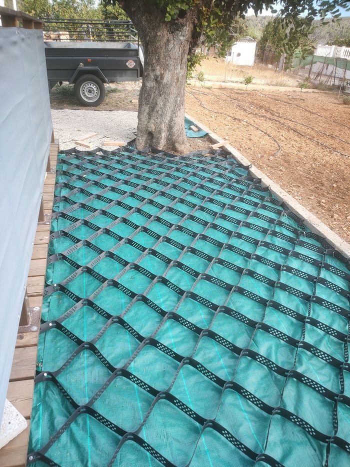 Laying the Geocelda Matting and filling with Stones