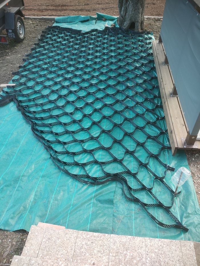Laying the Geocelda Matting and filling with Stones
